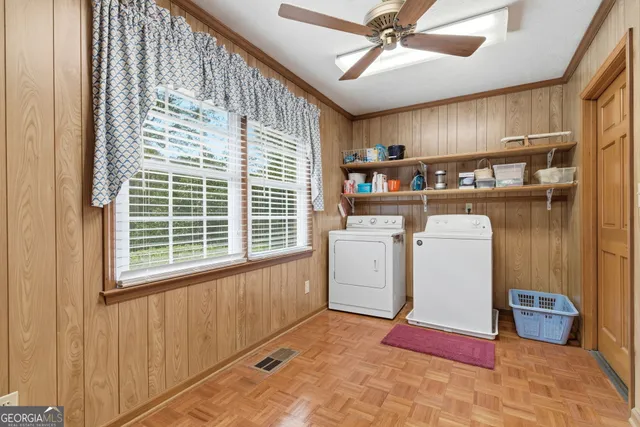a view of a empty room with gym equipment