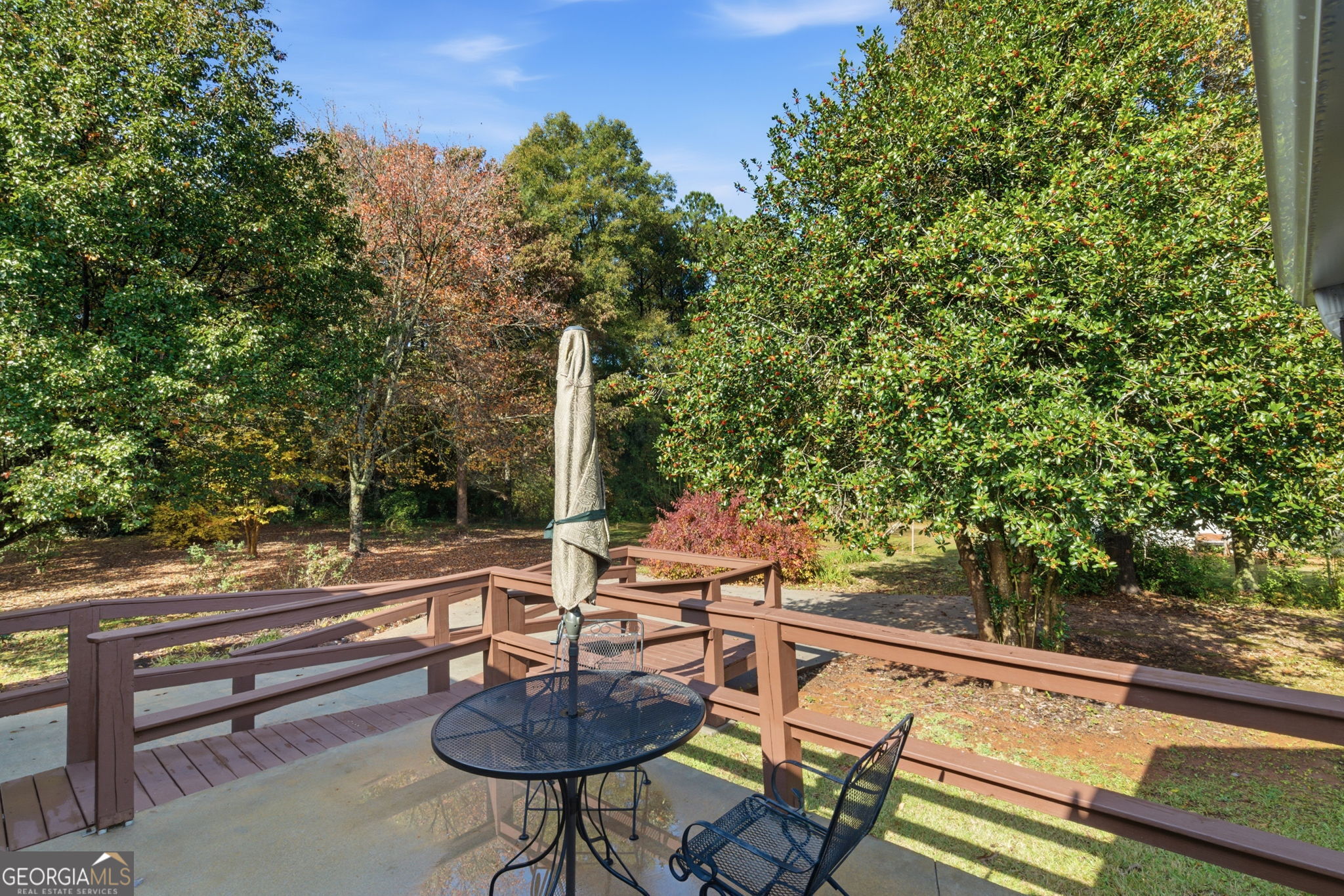 91 Almond Road LaGrange, GA 30241 - Photo 16 of 46 a view of yard from deck with patio