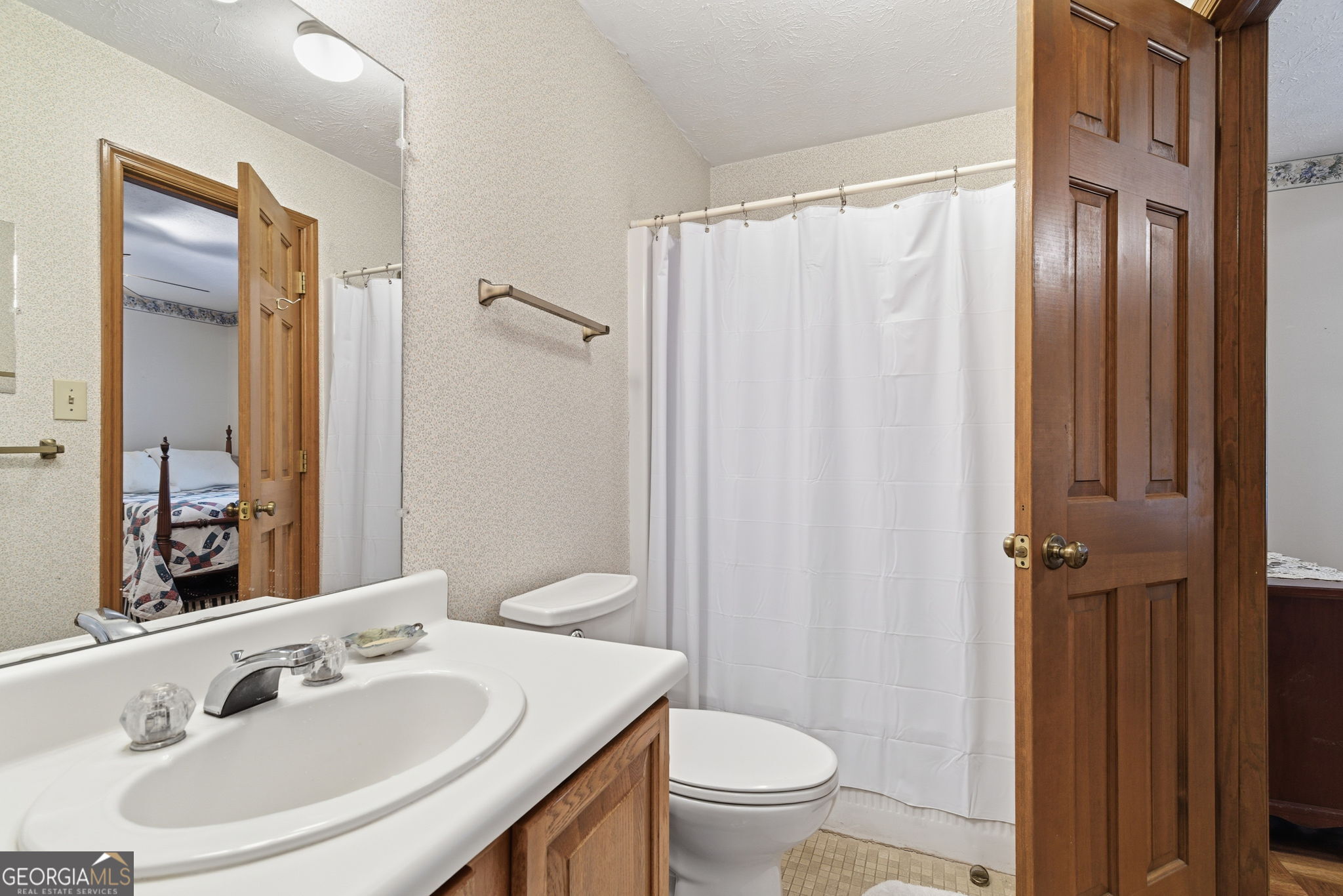 91 Almond Road LaGrange, GA 30241 - Photo 22 of 46 a bathroom with a sink and a mirror