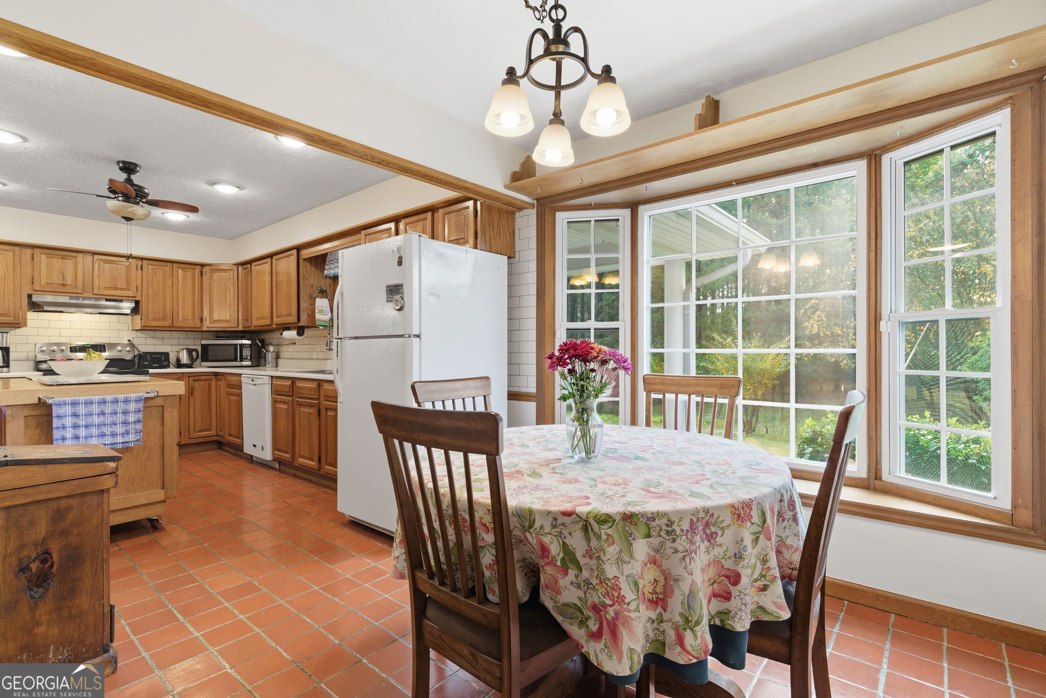 91 Almond Road LaGrange, GA 30241 - Photo 23 of 46 a view of a dining room with furniture window and wooden floor