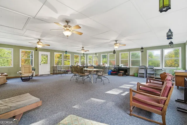 a view of a dining room with furniture