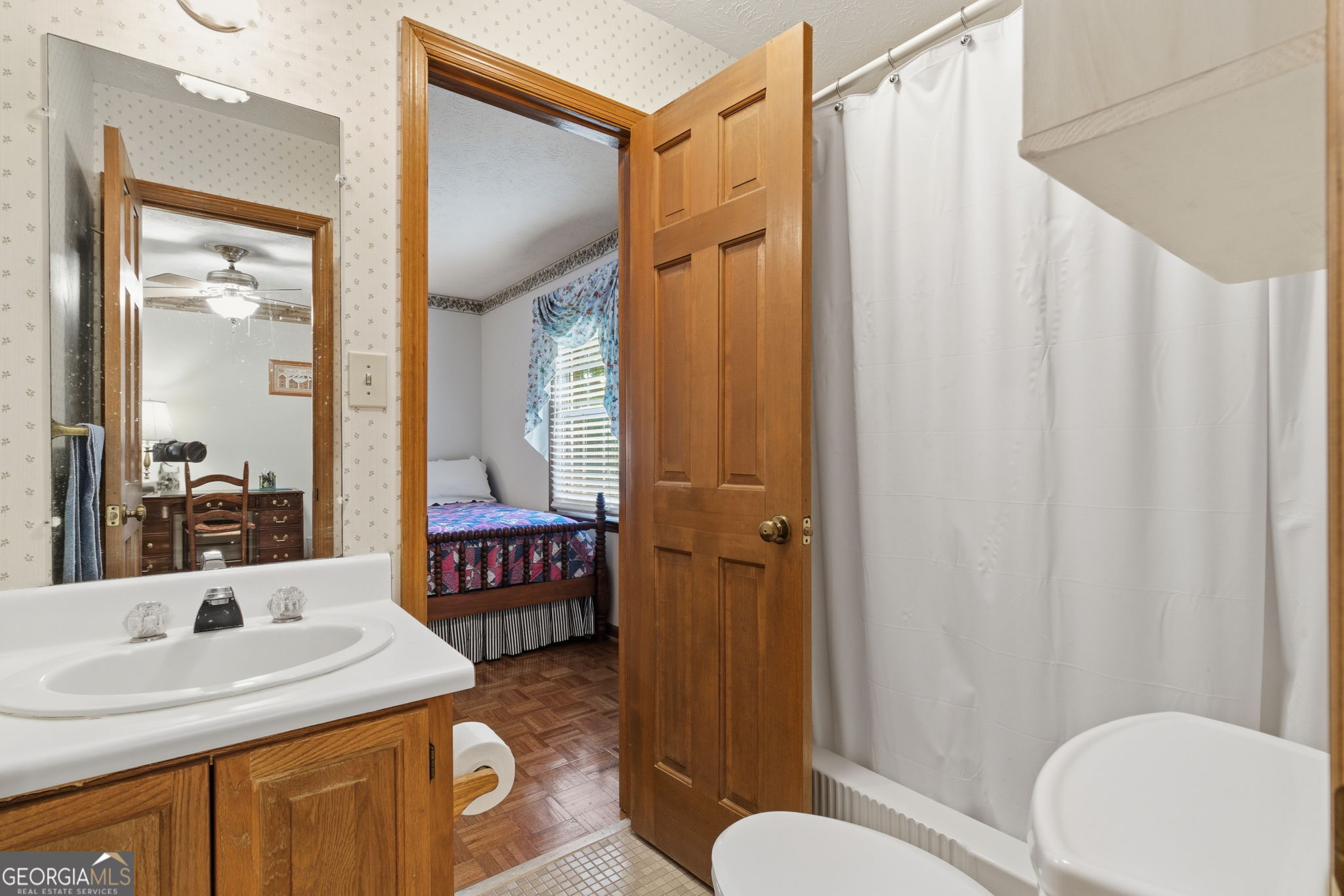 91 Almond Road LaGrange, GA 30241 - Photo 37 of 46 a bathroom with a sink a toilet and shower