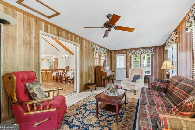 a kitchen with stainless steel appliances a sink stove and cabinets