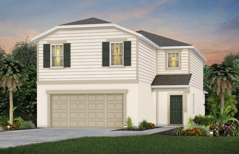 9589 Rally Spring Loop Wesley Chapel, FL 33545 - Photo 1 of 1 a front view of a house with a garden and plants