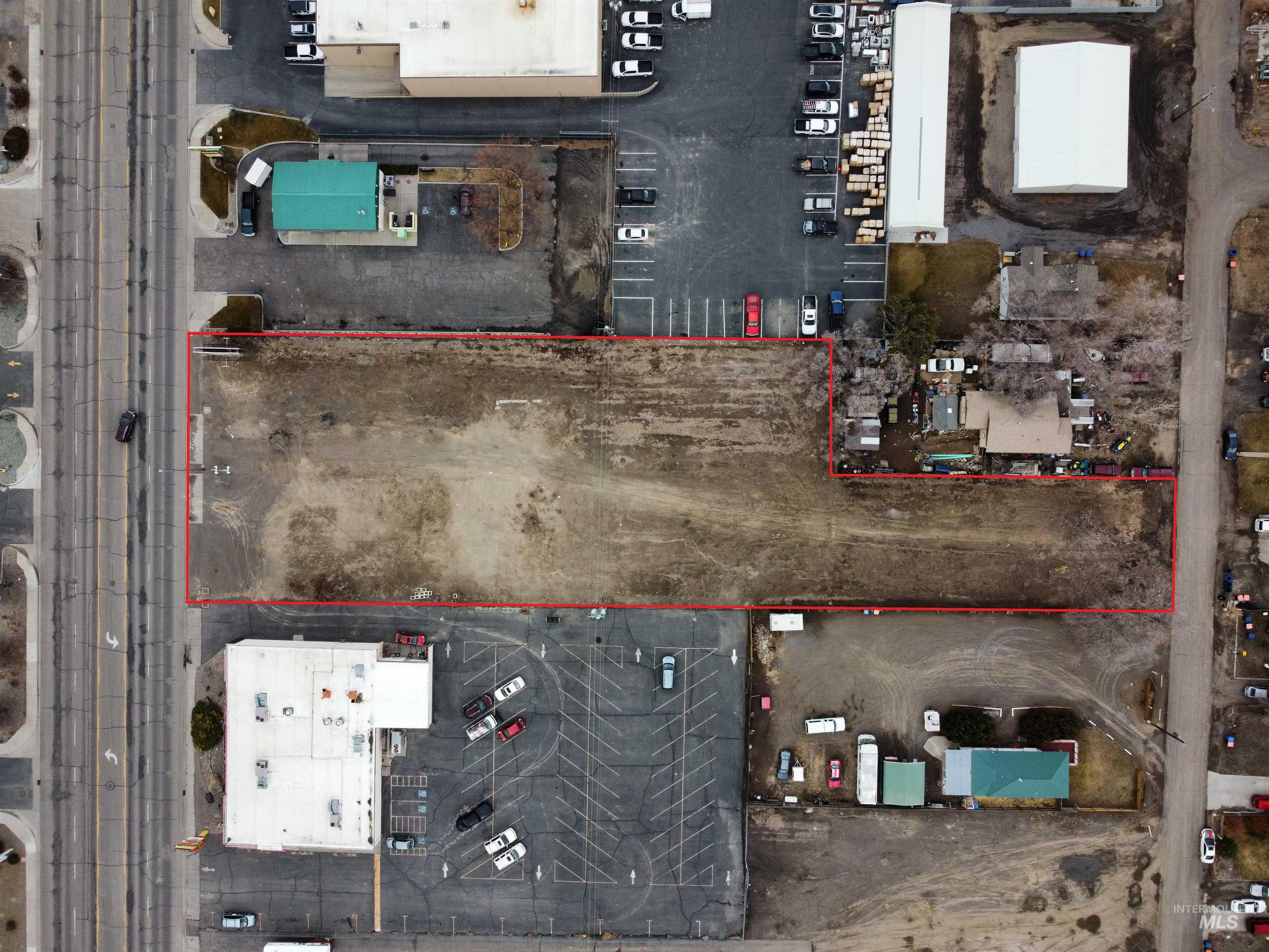 1701 Kimberly Road Twin Falls, ID 83301 - Photo 2 of 5 Aerial view of property and surrounding area with property parcel outlined