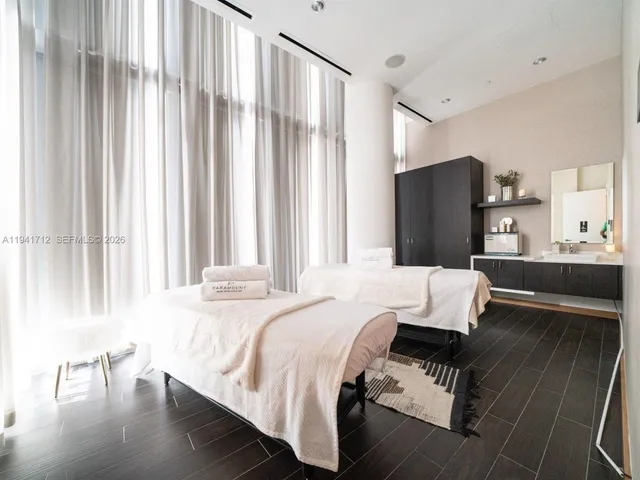 a swimming pool with outdoor seating