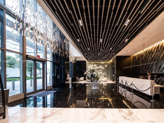 an aerial view of residential building with parking space