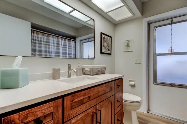 a view of a swimming pool with a yard