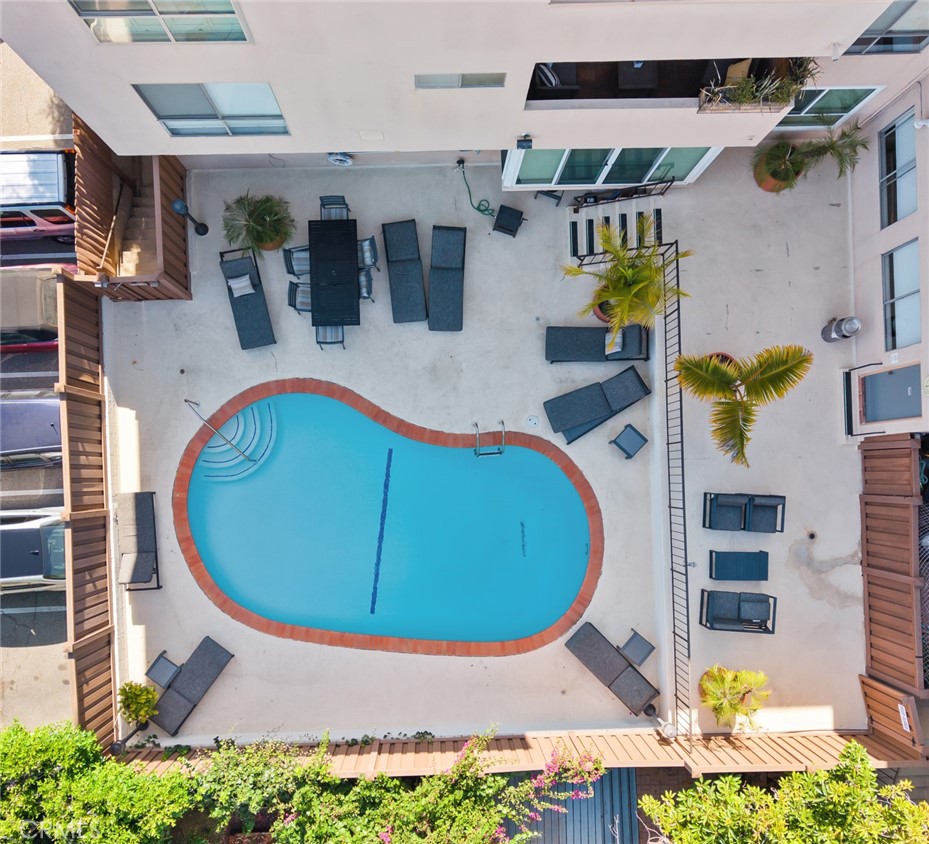1010 Palm Avenue, Unit 207 West Hollywood, CA 90069 - Photo 17 of 21 an aerial view of a house with swimming pool