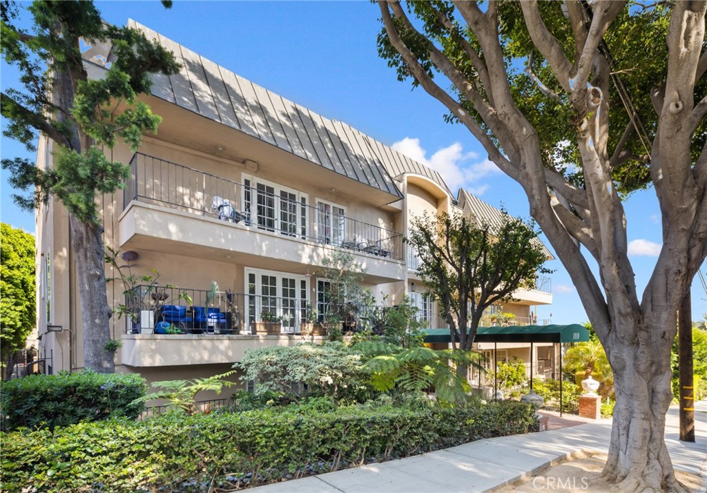 1010 Palm Avenue, Unit 207 West Hollywood, CA 90069 - Photo 5 of 21 front view of a building with a tree