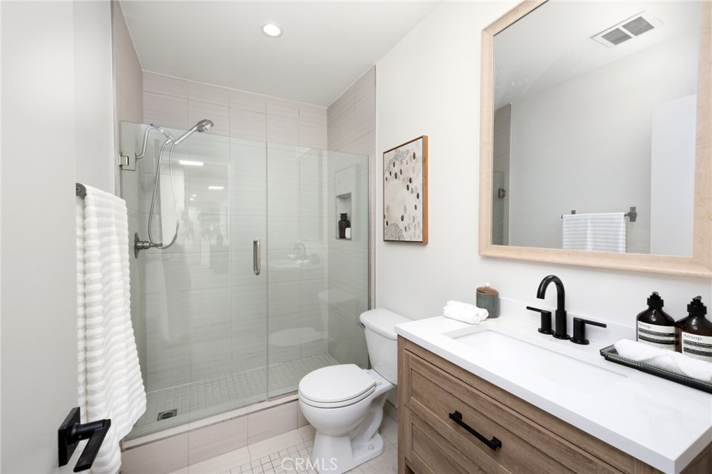 1010 Palm Avenue, Unit 207 West Hollywood, CA 90069 - Photo 9 of 21 a bathroom with a sink toilet and shower