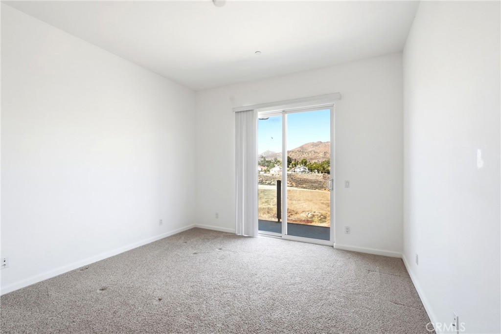 585 Vía Pueblo Riverside, CA 92507 - Photo 56 of 61 Bedroom #3 with access to balcony