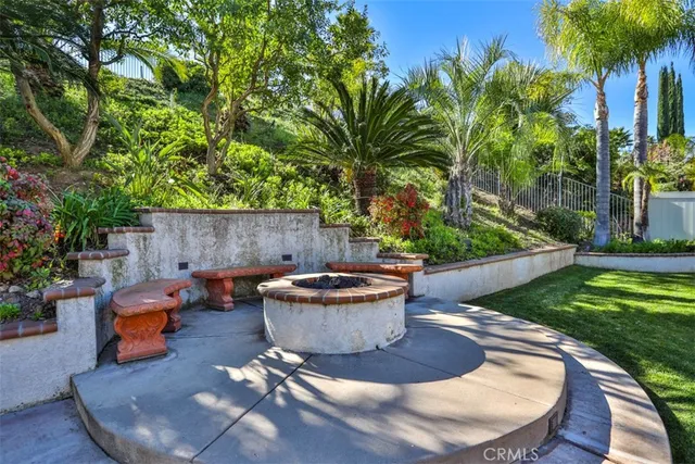 a front view of house with yard and outdoor seating