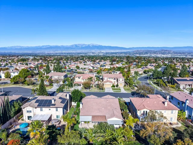an aerial view of residential house and green space