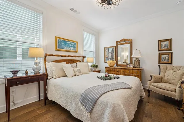 a bedroom with bed and window