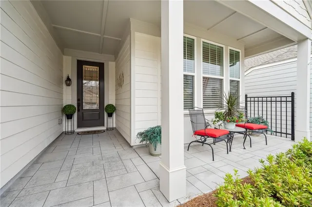 a view of a porch with chairs