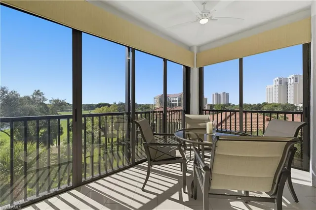 a view of a balcony with chairs