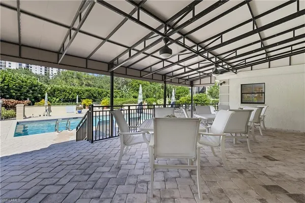 a view of a patio with a garden
