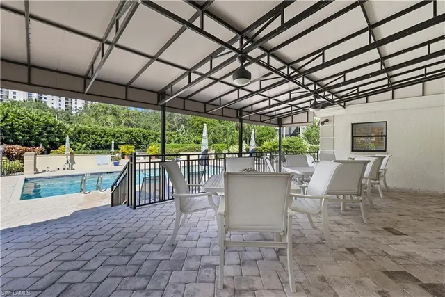 a view of a patio with a garden