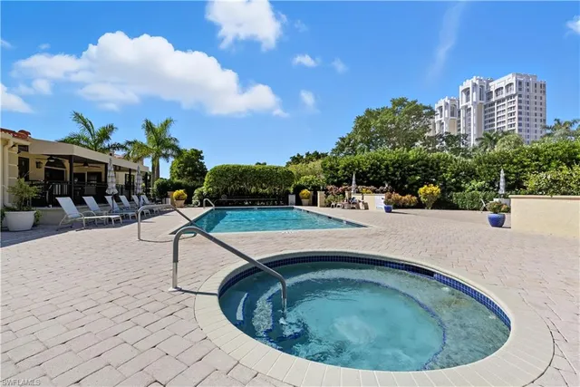 a room with gym equipment and windows