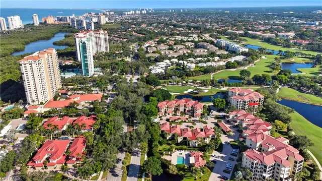 a view of a city and flowers