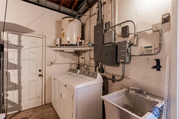 a bathroom with a sink and mirror