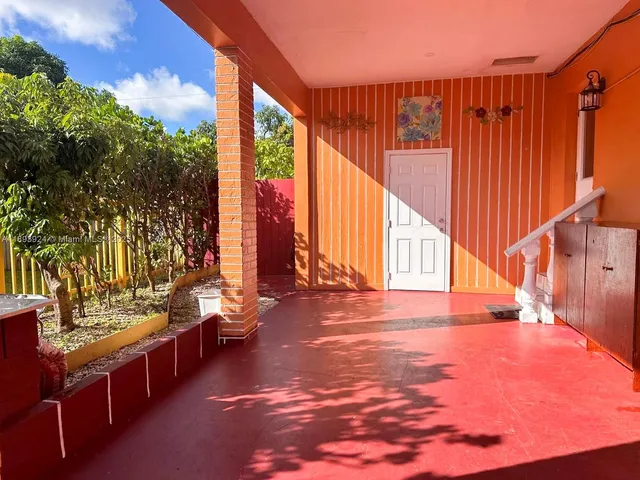 a view of outdoor space with seating area