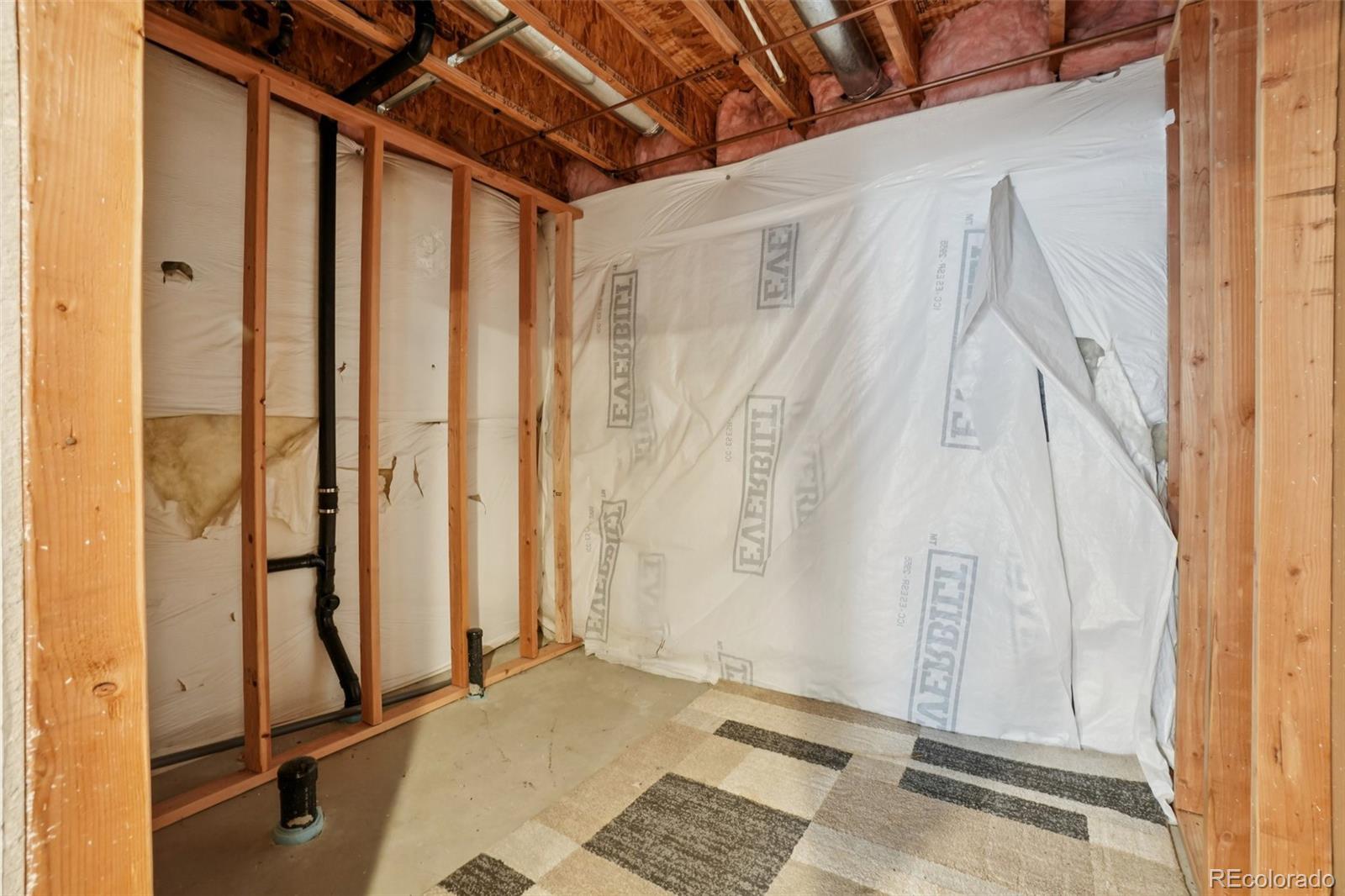 11205 Coal Ridge Street Firestone, CO 80504 - Photo 31 of 40 a view of a room with door