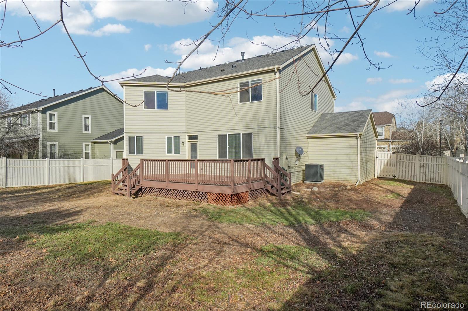 11205 Coal Ridge Street Firestone, CO 80504 - Photo 33 of 40 a house view with a backyard space
