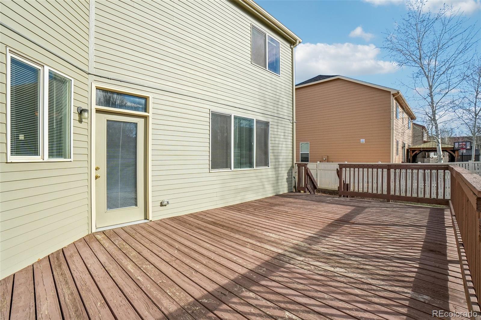11205 Coal Ridge Street Firestone, CO 80504 - Photo 35 of 40 a front view of a house with a yard