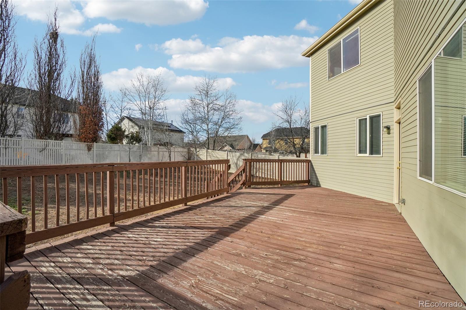 11205 Coal Ridge Street Firestone, CO 80504 - Photo 36 of 40 a view of a house with wooden floor