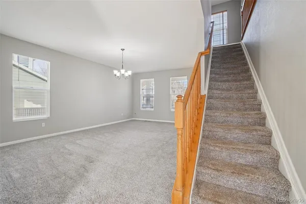 a view of a livingroom with a staircase