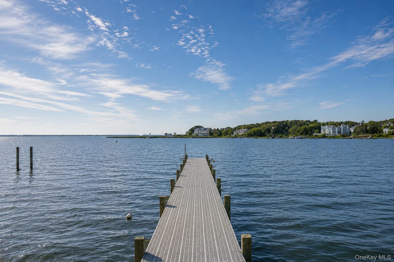 65 Shore Road Westhampton, NY 11977 - Photo 6 of 24 Private dock extending over expansive open water