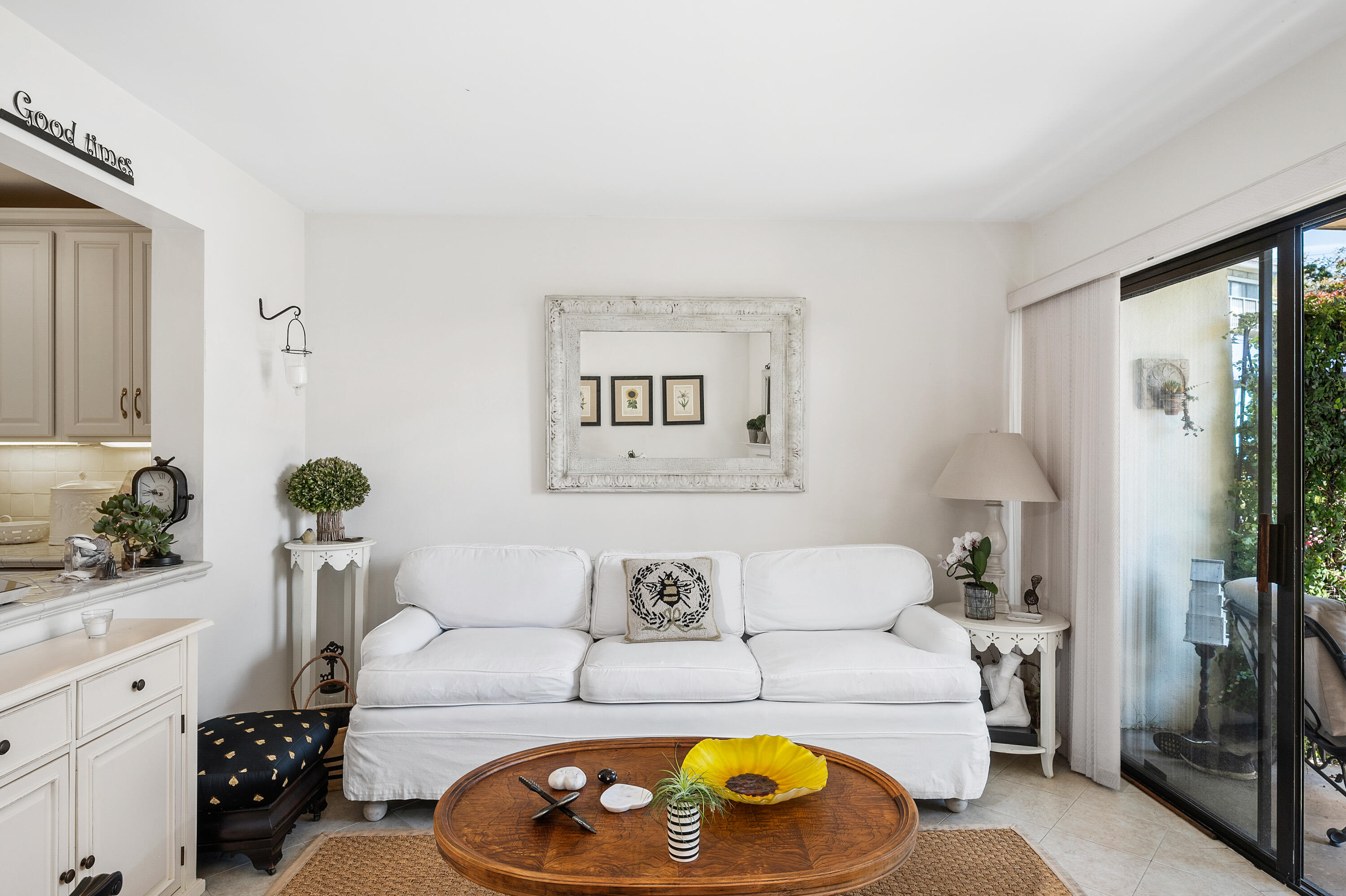 3375 Foothill Road, Unit 412 Carpinteria, CA 93013 - Photo 9 of 22 a living room with furniture and a lamp