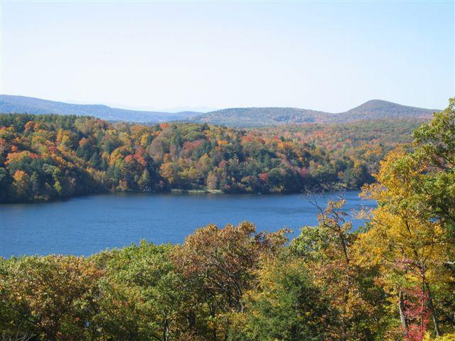 99 Hupi Road Monterey, MA 01245 - Photo 2 of 20 a view of a city with mountains in the background