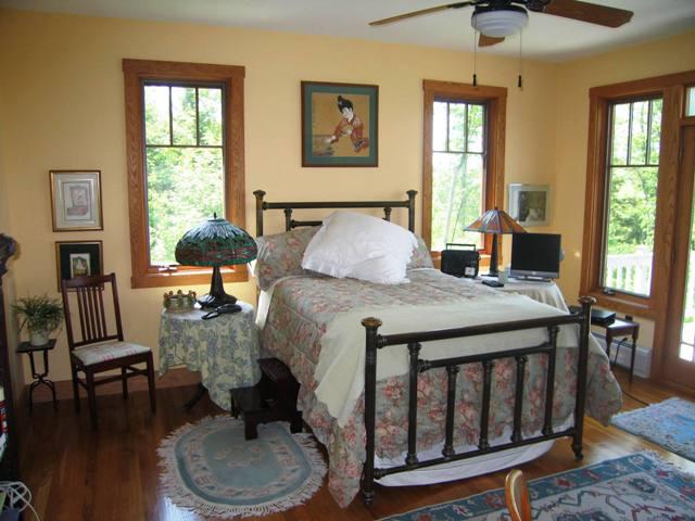 99 Hupi Road Monterey, MA 01245 - Photo 11 of 20 a bedroom with a bed and wooden floor