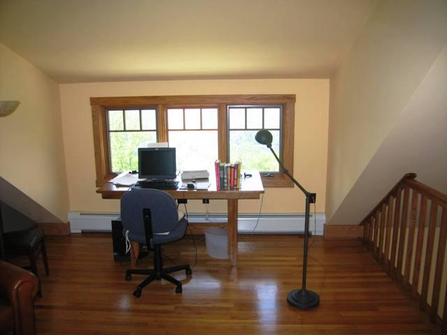 99 Hupi Road Monterey, MA 01245 - Photo 15 of 20 a view of a livingroom with lounge chair a ceiling fan