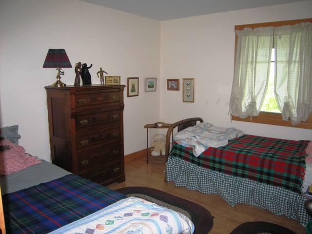 99 Hupi Road Monterey, MA 01245 - Photo 18 of 20 a bedroom with a bed and a window