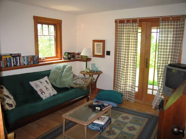 99 Hupi Road Monterey, MA 01245 - Photo 19 of 20 a living room with furniture and a flat screen tv
