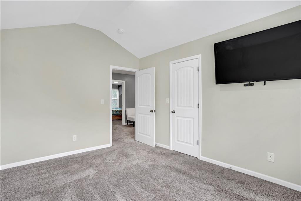 7789 Village Pass Fairburn, GA 30213 - Photo 33 of 35 a view of a livingroom with a flat screen tv
