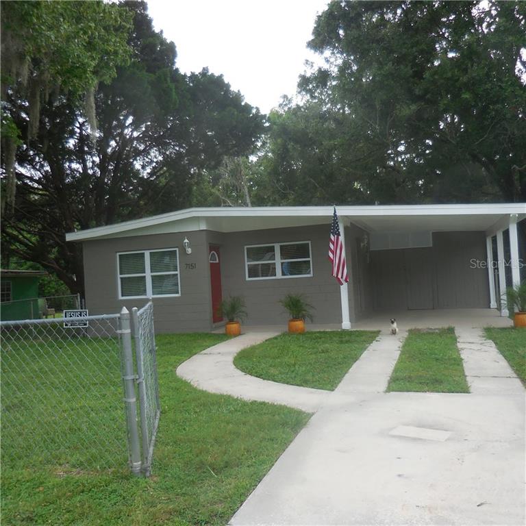7151 Adare Drive New Port Richey, FL 34653 - Photo 1 of 1 a view of a house with a yard