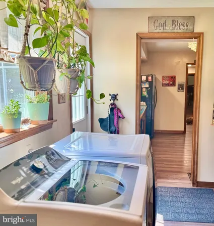 a room with a door and wooden floor