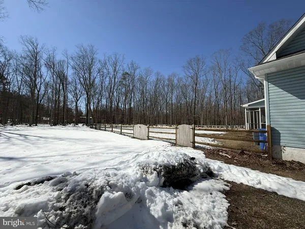 a view of a backyard of the house