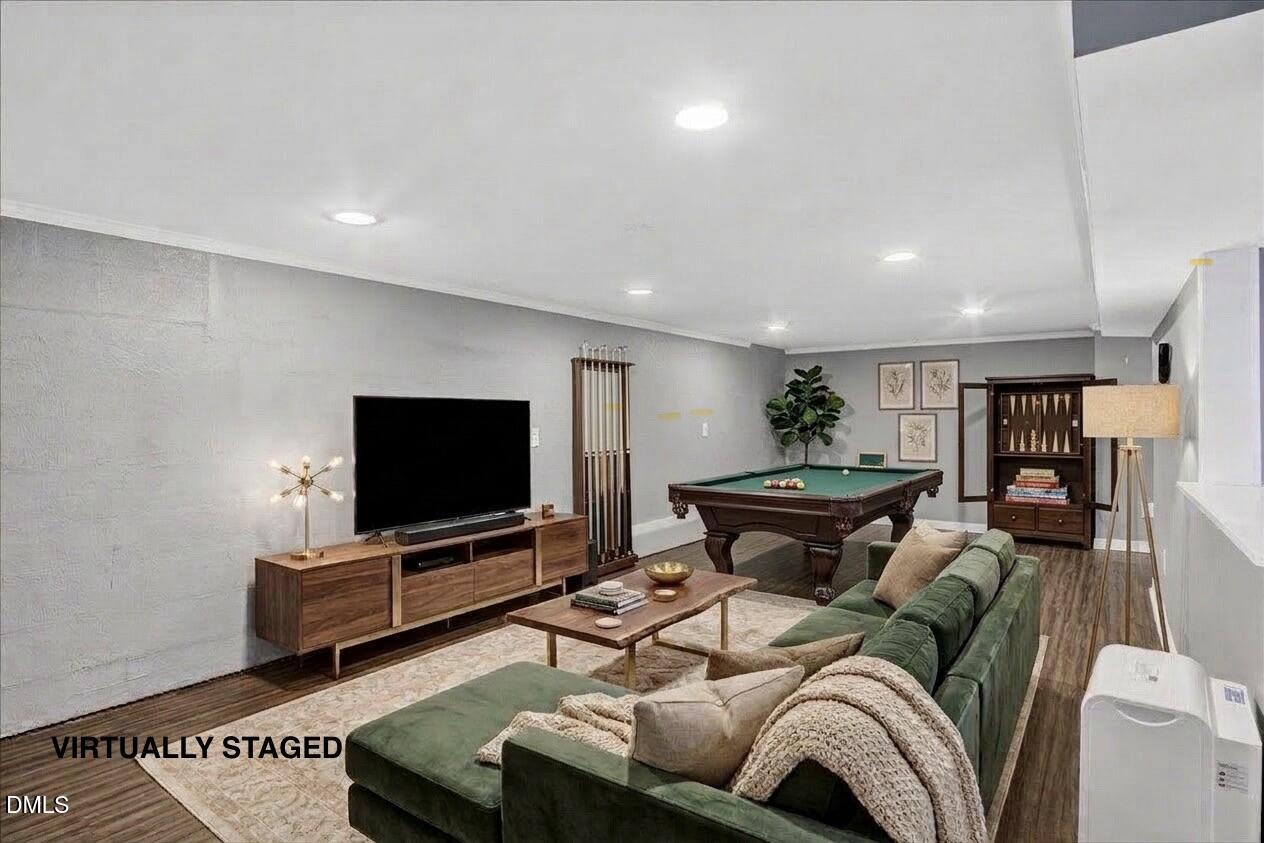 2118 Nutbush Road Henderson, NC 27537 - Photo 29 of 61 a living room with furniture and a flat screen tv