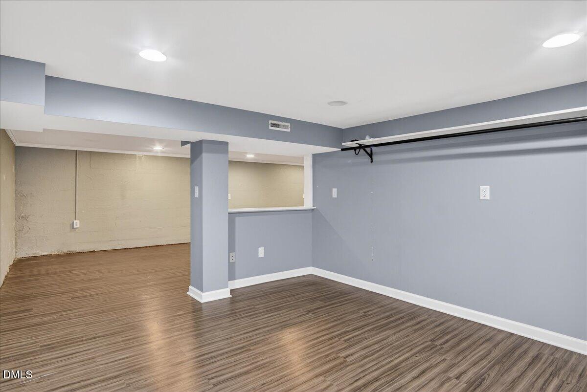 2118 Nutbush Road Henderson, NC 27537 - Photo 36 of 61 a view of an empty room with wooden floor