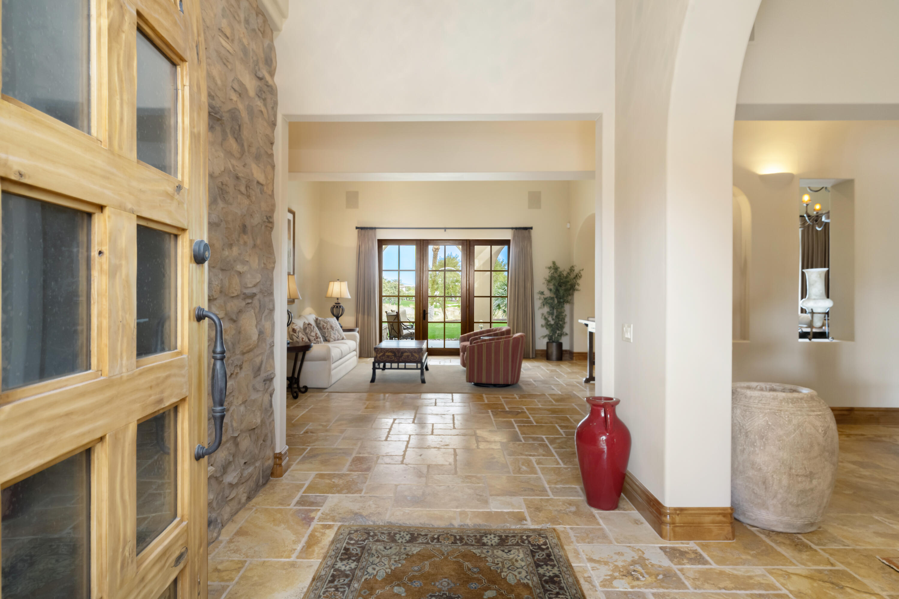 52844 Via Dona La Quinta, CA 92253 - Photo 11 of 46 a living room with furniture and a fireplace
