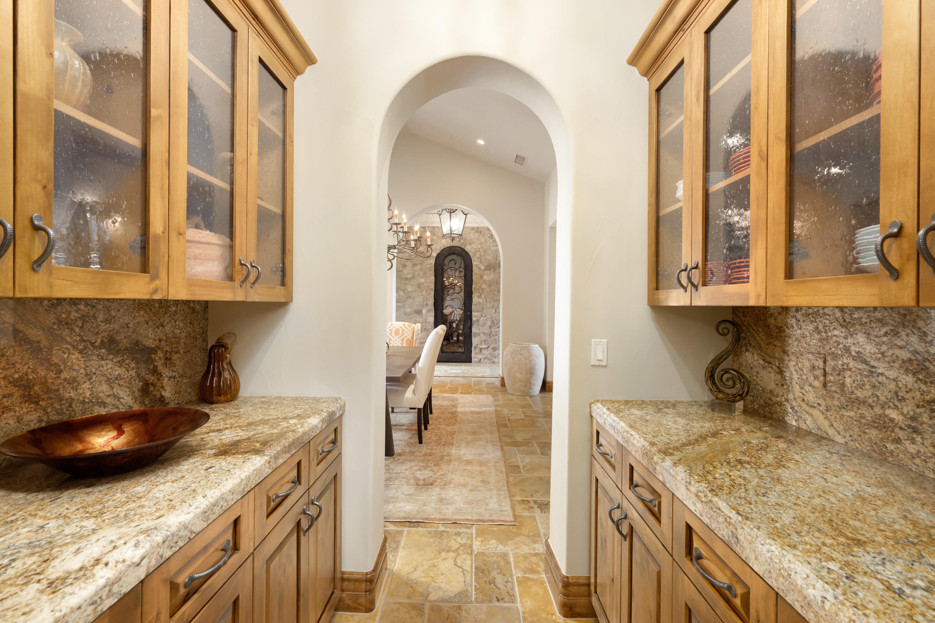 52844 Via Dona La Quinta, CA 92253 - Photo 21 of 46 a kitchen with a stove and a white wooden cabinets