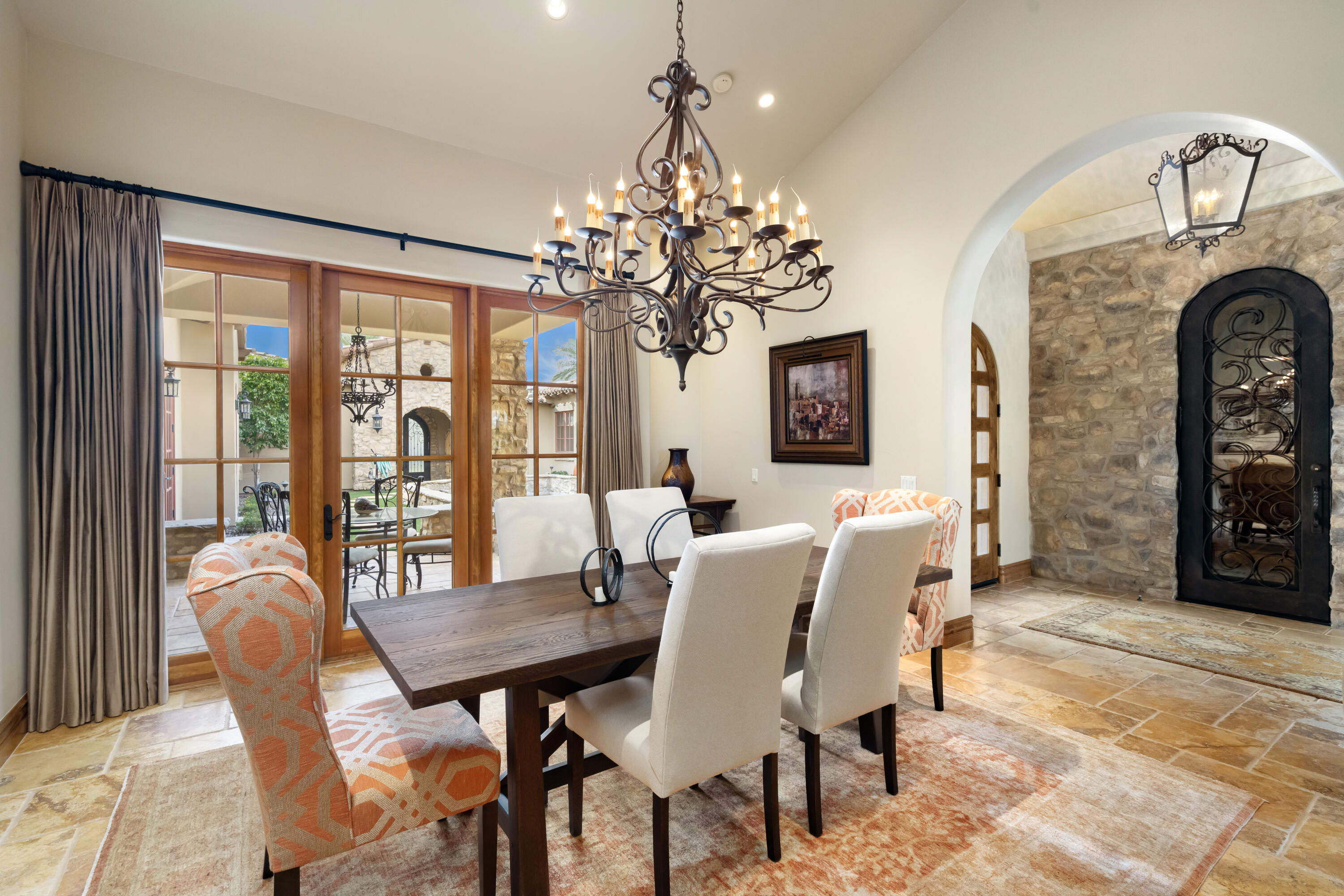 52844 Via Dona La Quinta, CA 92253 - Photo 22 of 46 a view of a dining room with furniture window and outside view