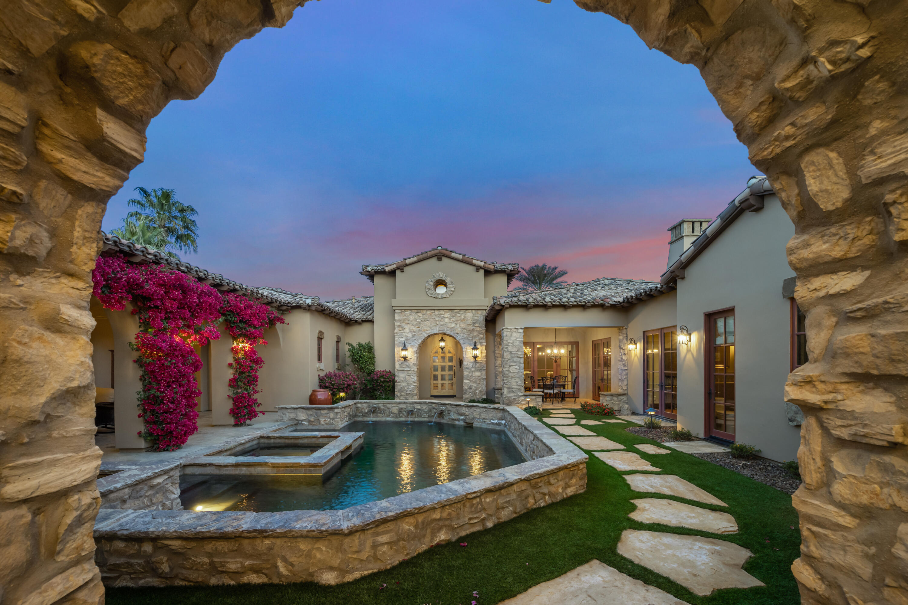 52844 Via Dona La Quinta, CA 92253 - Photo 3 of 46 a view of a house with swimming pool and a yard