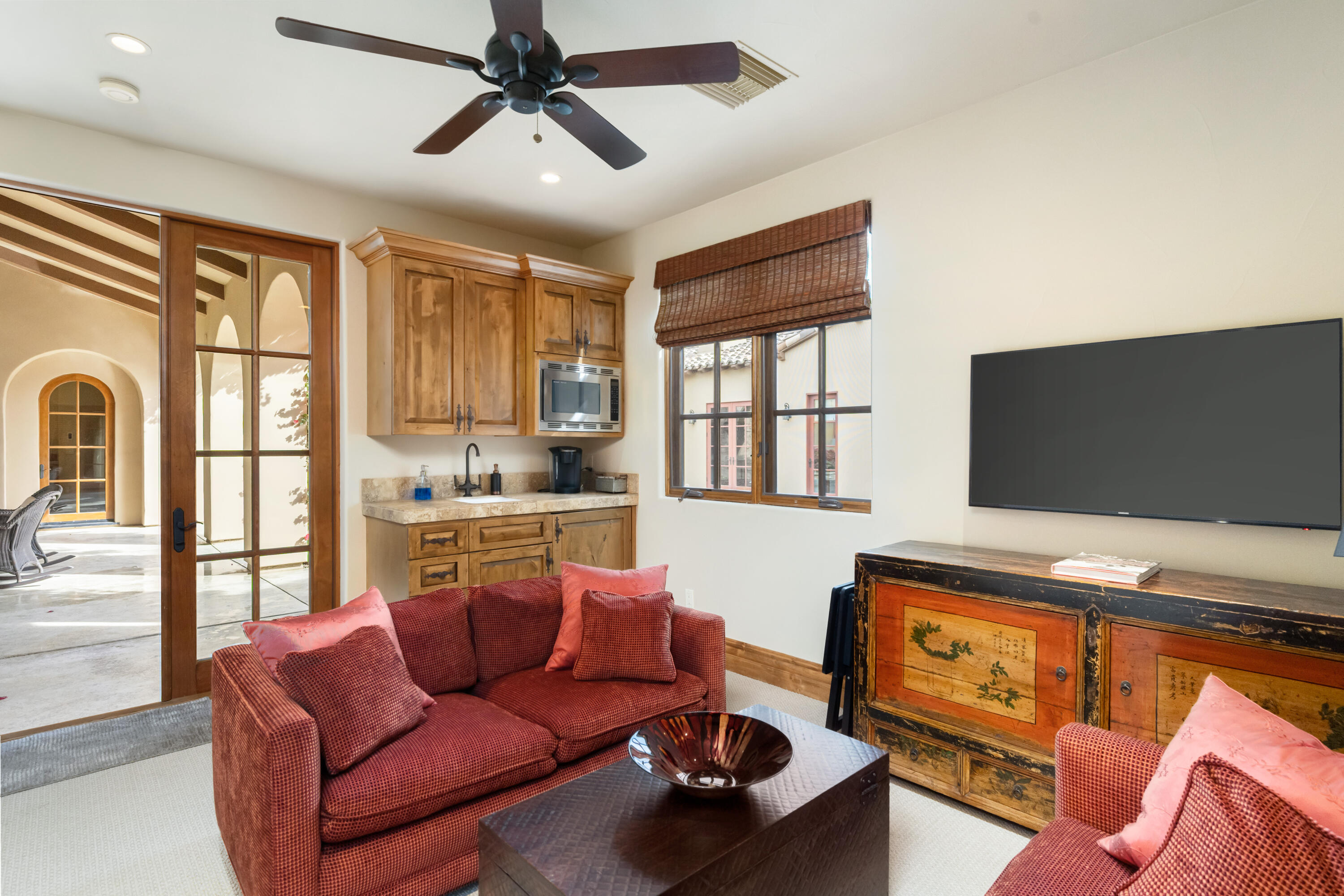 52844 Via Dona La Quinta, CA 92253 - Photo 34 of 46 a living room with furniture and a flat screen tv